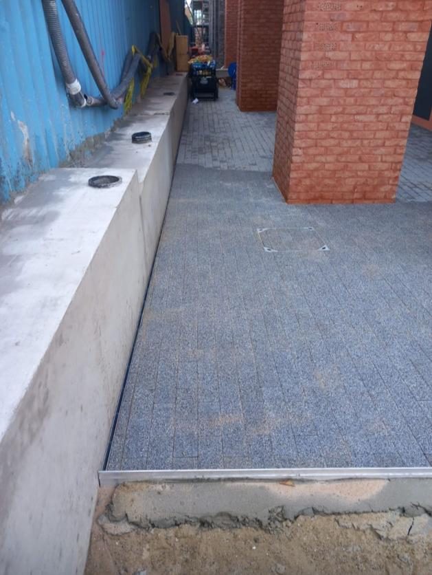 Kerbs and edgings set out at Osier Way, Tonbane Construction project near Brunel University, Uxbridge UB8